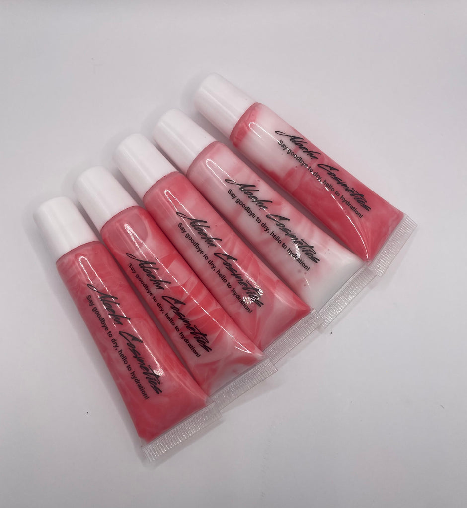 Close-up of a luscious strawberry cream gloss on lips, adding a shiny and moisturizing finish to the lips 