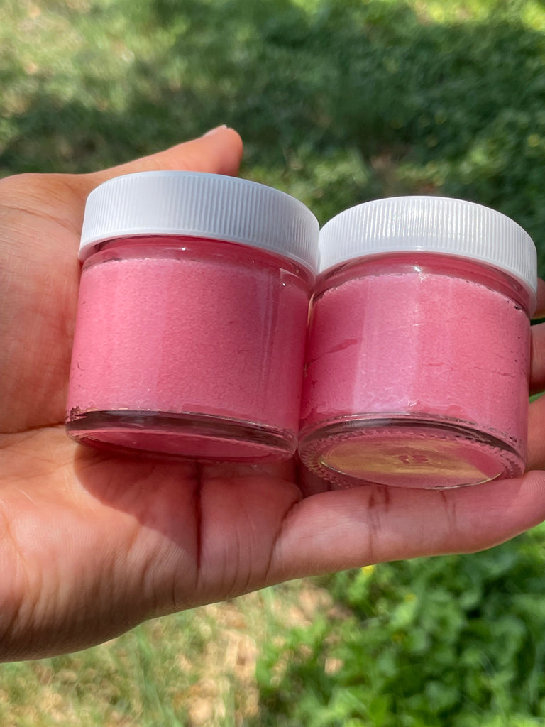 Exfoliating sugar lip scrub in a clear jar with white lid